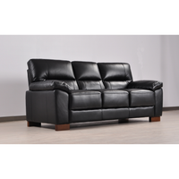 Dalmore Black 3 Seater – angled view of a black three-seater sofa in a stylish living room setting.