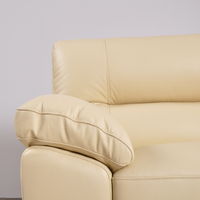 Cidliano Cream Armchair – detailed close-up of cream-colored armchair showcasing upholstery and design features.