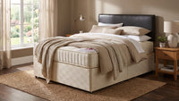 black leather bed in a room setting