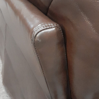 close up of outlet brown leather sofa