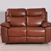 Brown leather reclining sofa on a plain background