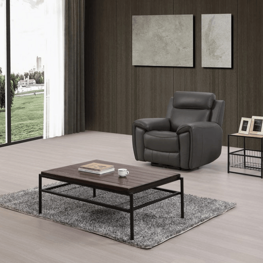 Modern living room with a gray recliner chair and wooden coffee table.