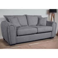 Gray sofa with cushions on a plain background