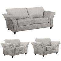 Gray sofa set with two armchairs on a white background