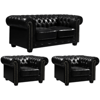 Black leather sofa set with two armchairs on a white background