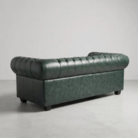 Chesterfield Green Leather Antique 3 seater sofa rear three-quarter studio view on a grey floor