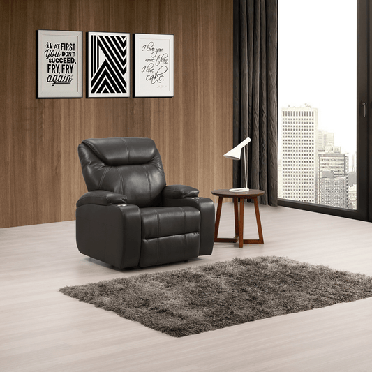 Modern living room with a black leather recliner chair, wooden side table, and cityscape view.