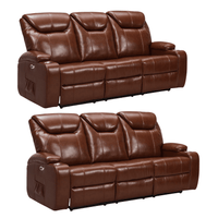 Two brown leather recliner sofas on a white background