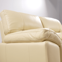 Cream 2-seater sofa close-up view on white background with modern sleek design