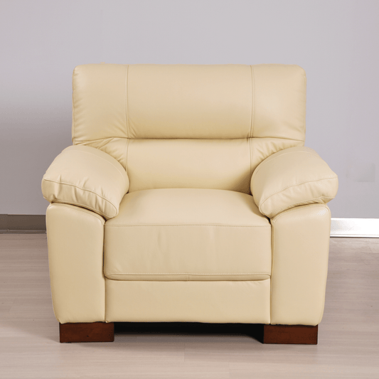 Cream armchair front facing in room setting with modern sleek design