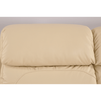 Beige sofa with a pillow on a plain background