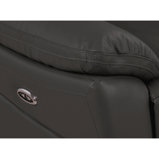 Close-up of a black leather seat with a visible brand logo on a white background