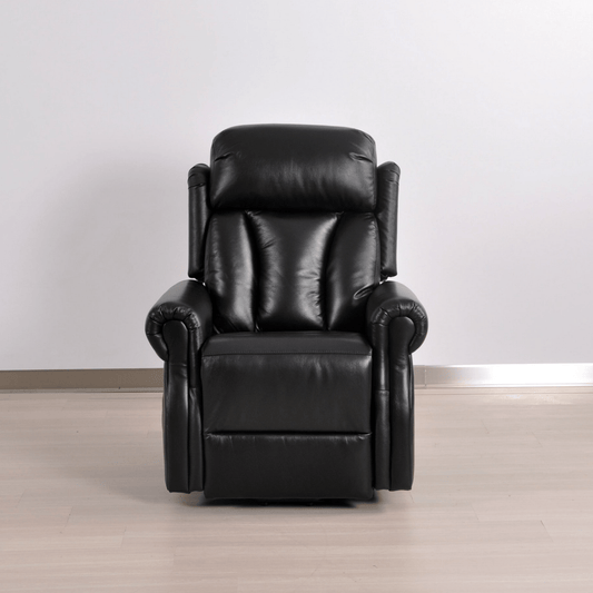 Black leather recliner chair on a wooden floor with a white wall background