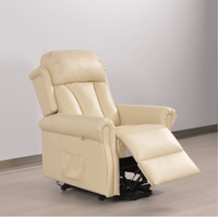 Beige recliner chair on a plain background