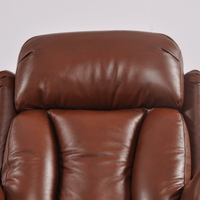 Close-up of a brown leather recliner chair