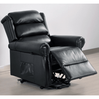Black leather recliner chair with armrests and footrest on a light wooden floor.