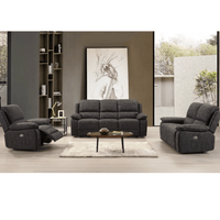 Gray sofa set with recliners in a living room setting