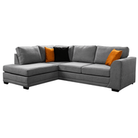 Ocra grey left-hand corner sofa displayed at an angled view on a clean white background, showing modern design details