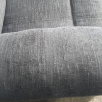 close up of outlet grey fabric sofa