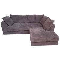 Gray sectional sofa with cushions on a white background