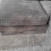 Close-up of a textured gray fabric surface