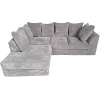 Gray sectional sofa with multiple cushions on a white background