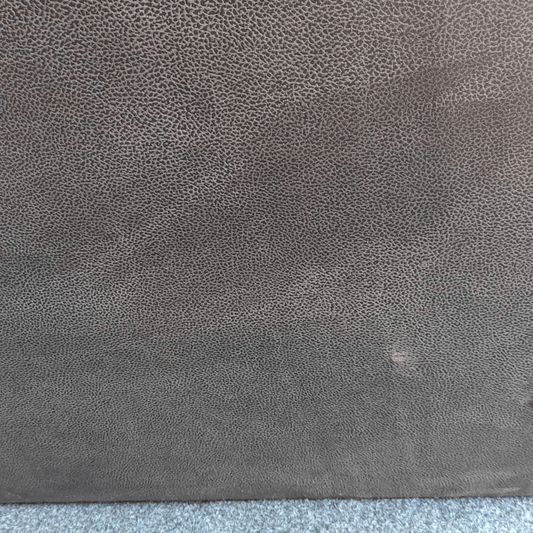 Close-up of a textured gray fabric surface