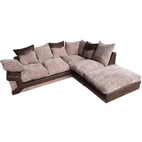 Brown and beige sectional sofa with cushions on a white background