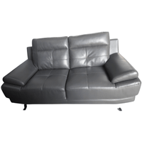 Gray leather sofa on a white background