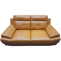 Brown leather sofa on a white background