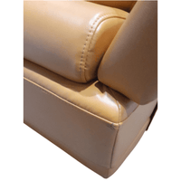 Close-up of yellow leather car seat with stitching details