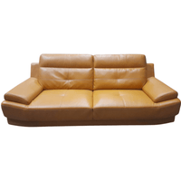 Yellow leather sofa on a white background