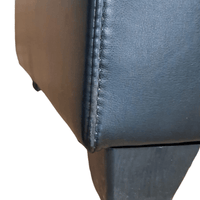 close up of black leather sofa