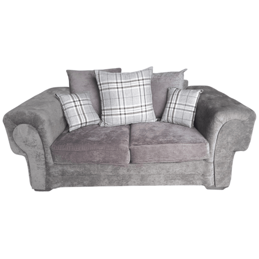 Gray sofa with plaid cushions on a white background