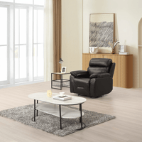 Renato Black armchair in a modern roomset, black upholstery, stylish and comfortable living room furniture