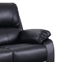 Close-up of a black leather recliner chair on a white background