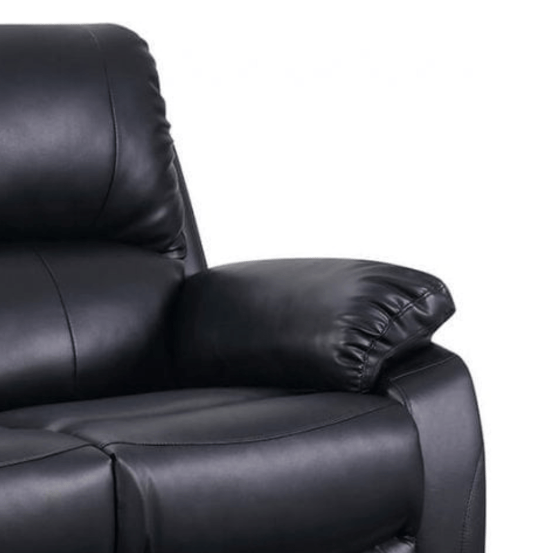 Close-up of a black leather recliner chair on a white background