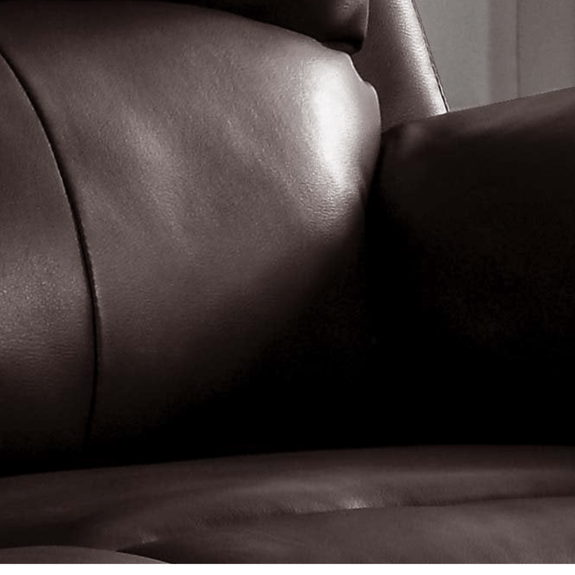 Close-up of a brown leather armchair