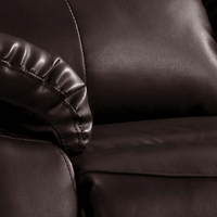 Close-up of a brown leather armchair
