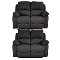 Two grey recliner sofas on a white background