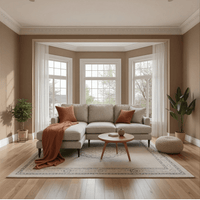 Living room with a sectional sofa, coffee table, and decorative pillows.