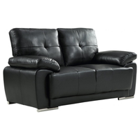 Black leather sofa on a white background