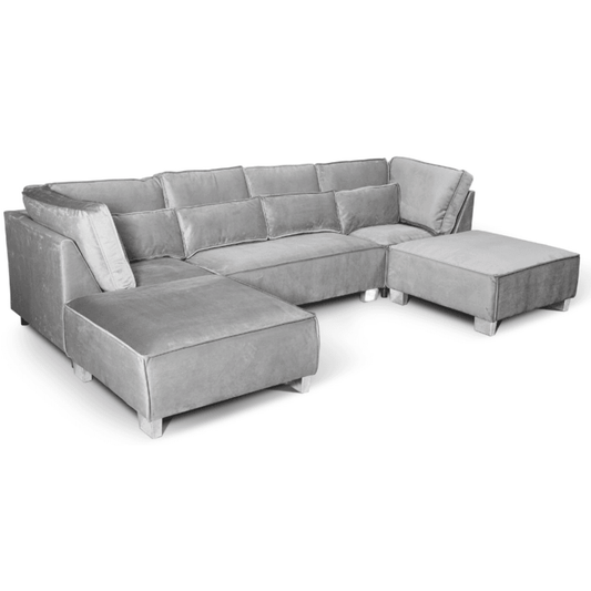 Gray sectional sofa with ottoman on a white background