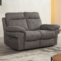 Gray recliner sofa in a room with a neutral color scheme