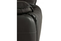 Close-up of a dark brown leather armchair corner on a white background