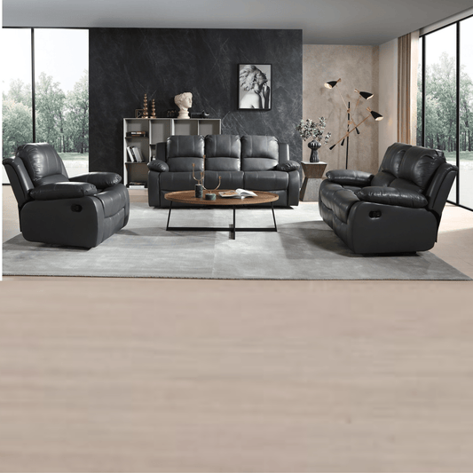 Modern living room with black leather sofa set and coffee table.