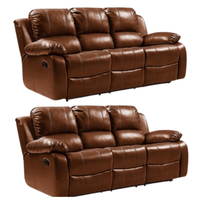 Two brown leather reclining sofas on a white background