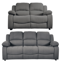 Two gray sofas on a white background