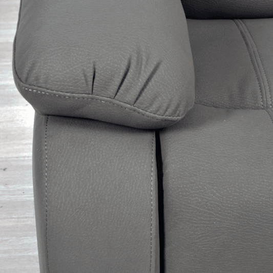 comfortable grey fabric armchair with soft cushions