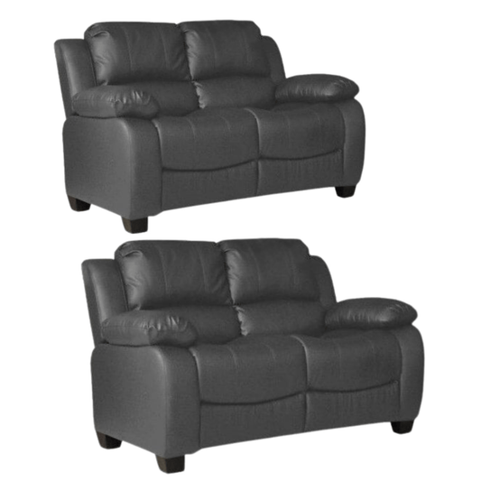 Two gray leather recliner sofas on a white background